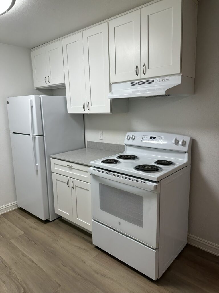 Full kitchen with dishwasher in a Sherwood Glen apartment home